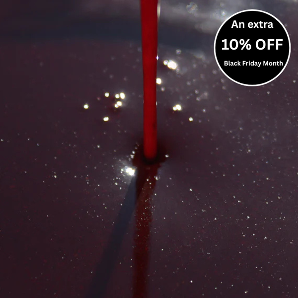 A close-up image of Haith's Liquid Robin Red being poured